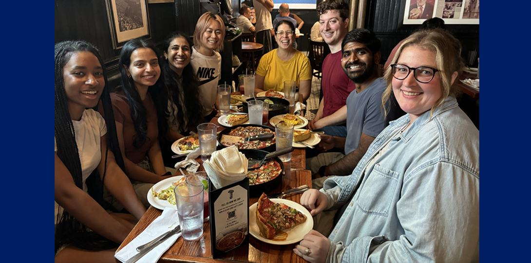 2024 Naba lab members around a table at Uno Pizza
